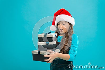 Child got surprise gift. Happy new year. Packaging for gifts. Lot presents. Christmas celebrated throughout globe. Small Stock Photo
