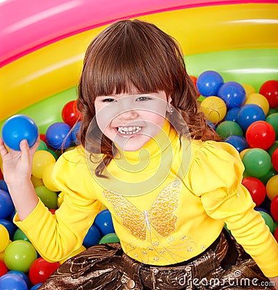 Child in group colourful ball. Stock Photo
