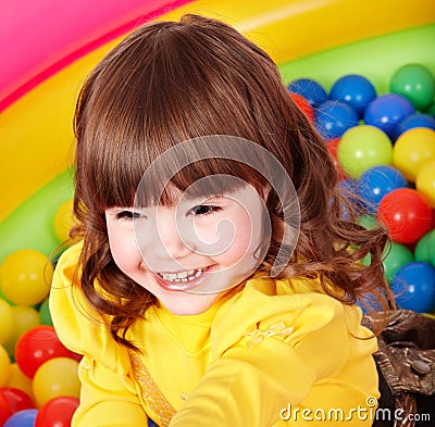 Child in group colourful ball. Stock Photo