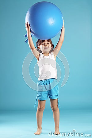 Child with gymnastic ball Stock Photo