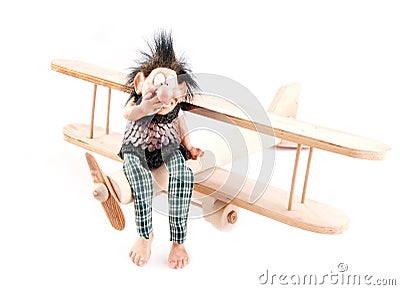 Child hand made aircraft and troll Stock Photo