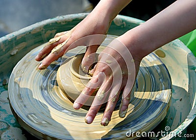 child hand makes the clay modelling Stock Photo