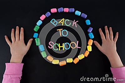 Child hands made the words Back To School. Stock Photo