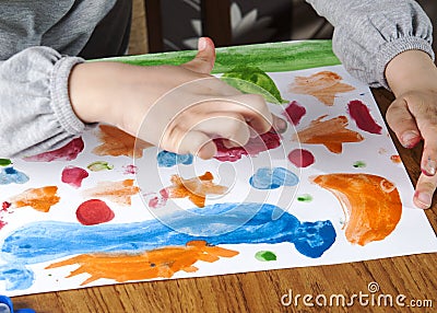 Child hands painting Stock Photo