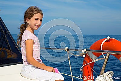 Child happy girl sailing happy boat Stock Photo