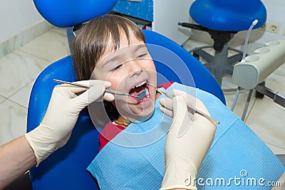 Child having teeth examined at dentists Stock Photo