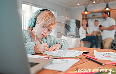 Child, headphones and drawing in kitchen at laptop in home for online class, distance studying or virtual learning help Stock Photo