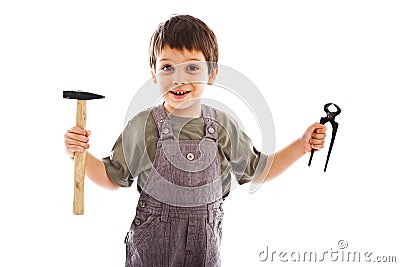 Child holding carpenter tools Stock Photo