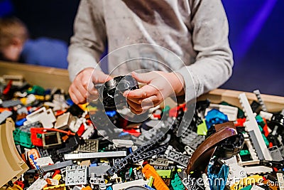 Child holding lego blocks 2018 Stock Photo