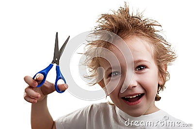 Child holding scissors Stock Photo