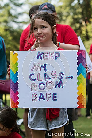 Child Holds Anti Gun Sign At Atlanta Rally Opposing NRA Editorial Stock Photo