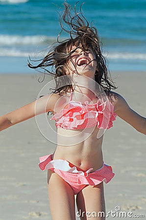 Child jumping for joy Stock Photo