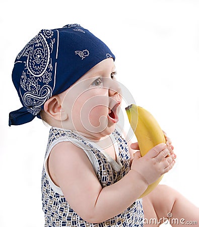 Child keeps banana Stock Photo