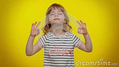 Child kid girl breathes deeply with mudra gesture, eyes closed, meditating, keep calm down, relax Stock Photo