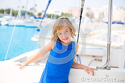 Child kid girl in marina boat on summer vacations Stock Photo