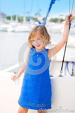 Child kid girl in marina boat on summer vacations Stock Photo