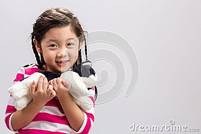 Child with Kitten Doll Background / Child with Kitten Doll / Chi Stock Photo
