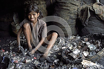 Child labor in recycling of batteries, Bangladesh Editorial Stock Photo