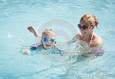 Child Learning to swim Stock Photo