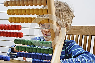 Child learns to count Stock Photo