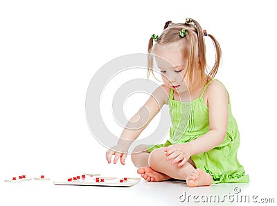 Child little girl playing with developmental toy Stock Photo