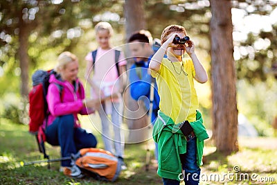 Child looking through binocular Stock Photo