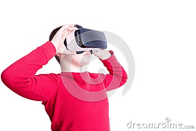 Child looking through virtual reality glasses Stock Photo
