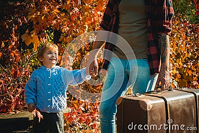 Child love. Parent teach baby. Man with beard, dad with young son in autumn park. We like autumn time together Stock Photo