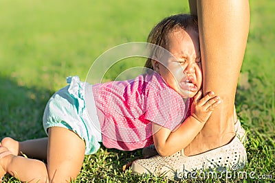 Mother ignoring her baby crying Stock Photo