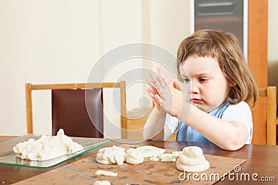 The child makes dough figurines Stock Photo