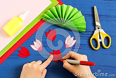 Child makes gift to March 8 or Mother`s Day. Step 7 Stock Photo