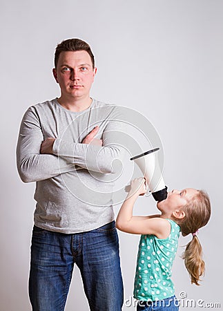 Child in a megaphone parent Stock Photo