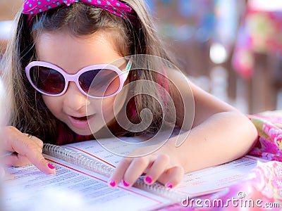 Child with menu Stock Photo