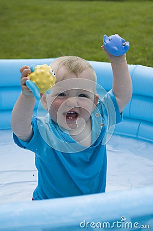 Child paddling in the pool Stock Photo