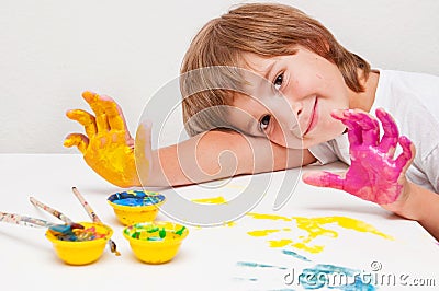 Child painting showing hands Stock Photo