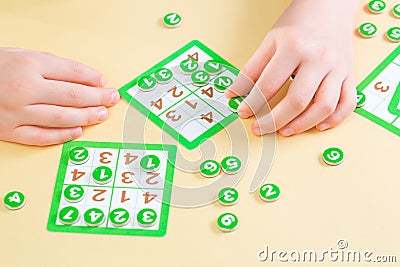 Child pays sudoku board game Stock Photo