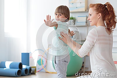 Child during physical therapy session Stock Photo