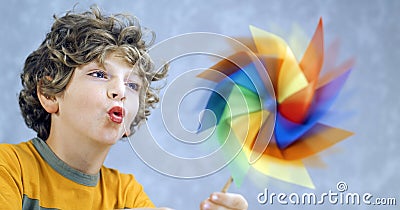 Child and a pinwheel Stock Photo