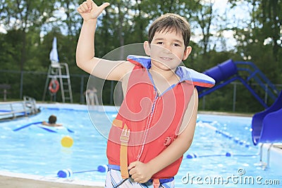 Child play at the pool place in a beautifull Stock Photo