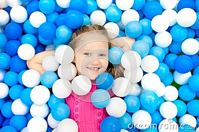 Kids play in ball pit. Child playing in balls pool Stock Photo