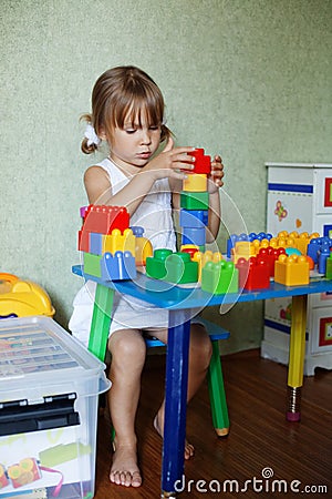 Child playing with constructor Stock Photo