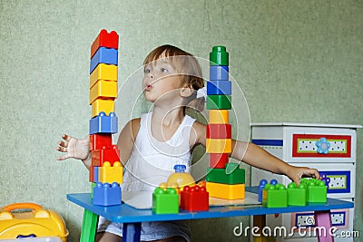 Child playing with constructor Stock Photo