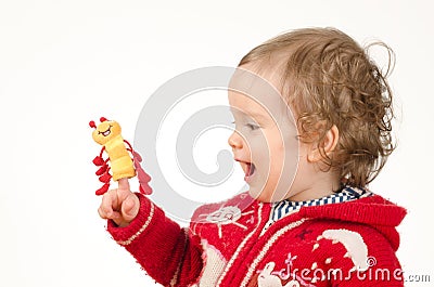 Child playing with finger puppet Stock Photo