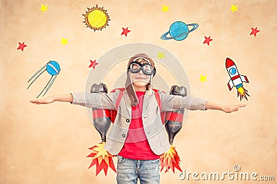 Kid with jet pack at home Stock Photo