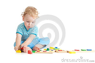 Child playing logical education toys with interest Stock Photo