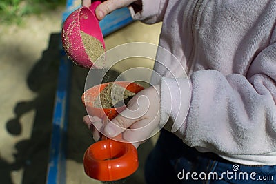 Toys for the sandbox in children`s hands Stock Photo