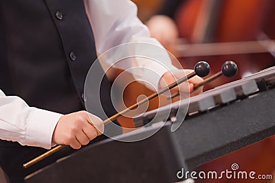 Child playing on the xylophone Stock Photo