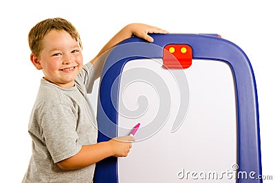 Child pointing at dry erase board Stock Photo