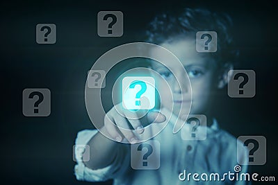 Child pressing a button with the question mark icon on a virtual screen Stock Photo