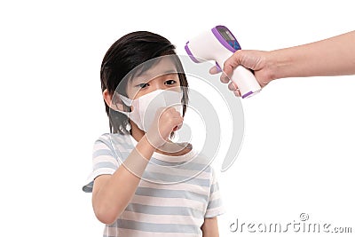 Child with protection mask with infared thermometer Stock Photo